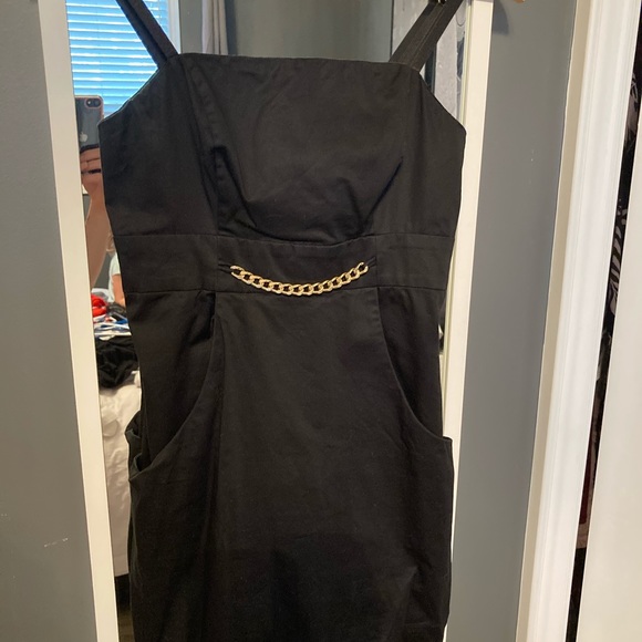 Guess black mini dress with pockets and gold chain. - Picture 2 of 5